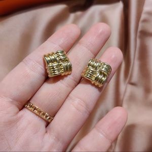 Gold ear stud earrings